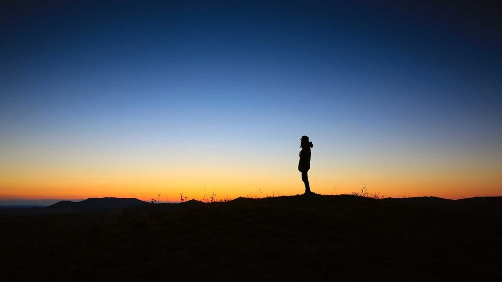 mindfulness meditation in stillness, at sunset